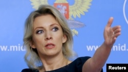 FILE - Russian Foreign Ministry spokesperson Maria Zakharova gestures during a news briefing in Moscow, Russia, Oct. 6, 2015. 