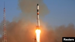 The Progress space freighter blasts off from its launchpad at the Baikonur Cosmodrome in Kazakhstan October 30, 2011