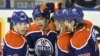 Edmonton Oilers' Ryan Nugent-Hopkins, Taylor Hall, Ales Hemsky and Tom Gilbert celebrate a goal against the Phoenix Coyotes during the third period of their NHL hockey game in Edmonton February 25, 2012. REUTERS/Dan Riedlhuber (CANADA - Tags: SPORT ICE HO